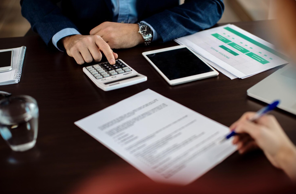 Business Owners Managing Finances for Tax Preparation 